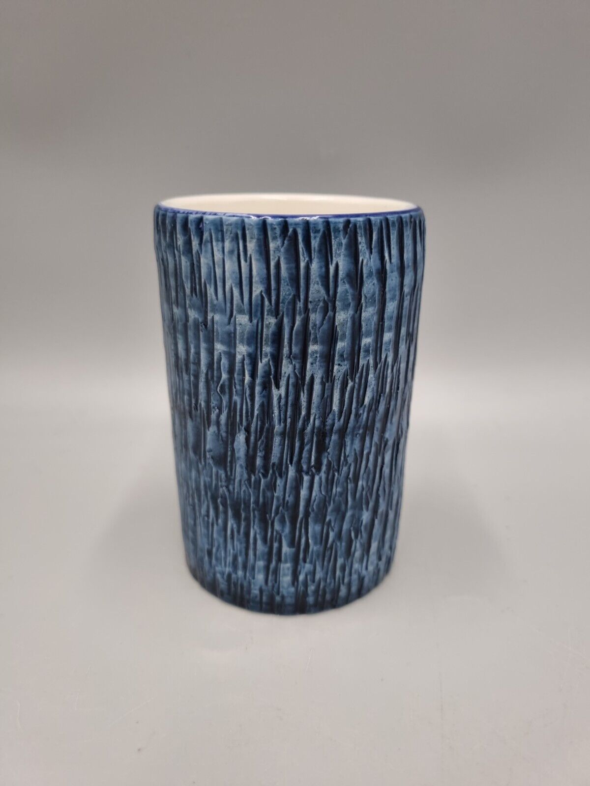 A Vintage Studio Pottery Bristow Malta Blue Textured Beaker. VGC.