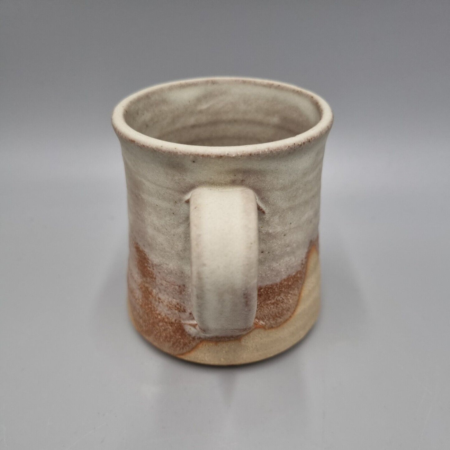 A Roger Bunn Studio Pottery Small Mug. VGC.