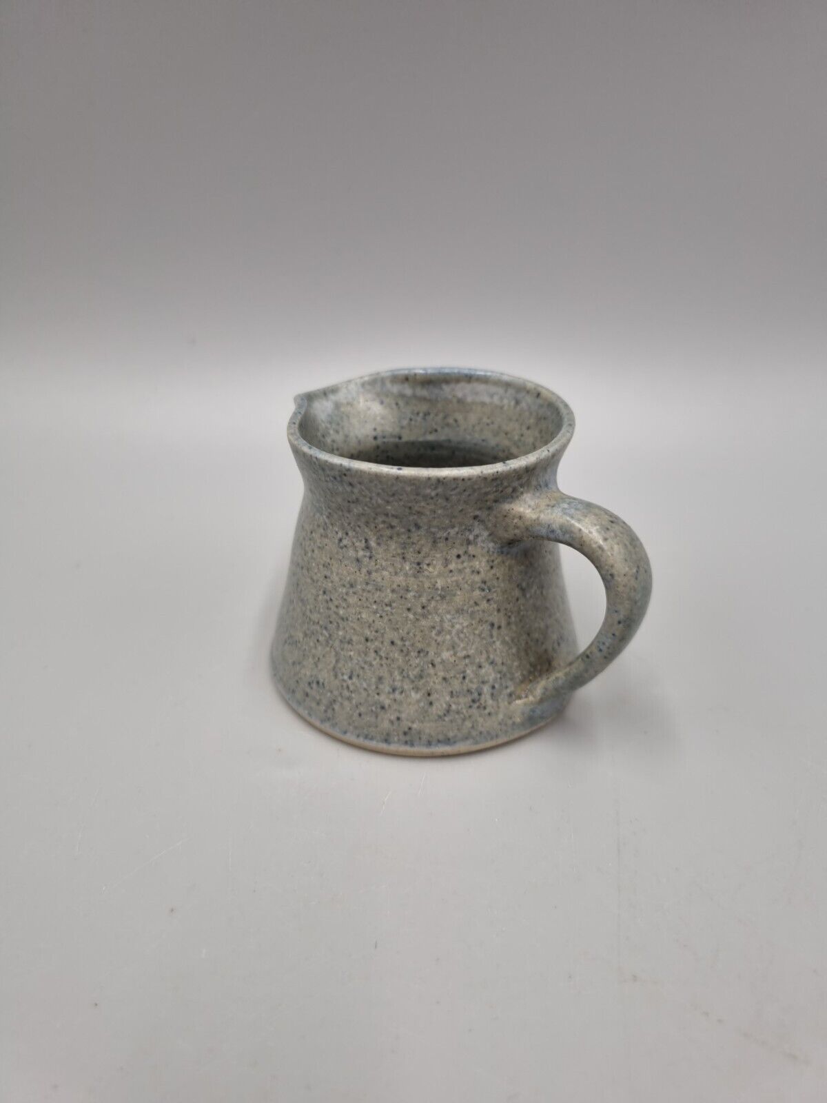 A Small Studio Pottery Jug, 'Storrington' Written To The Base.