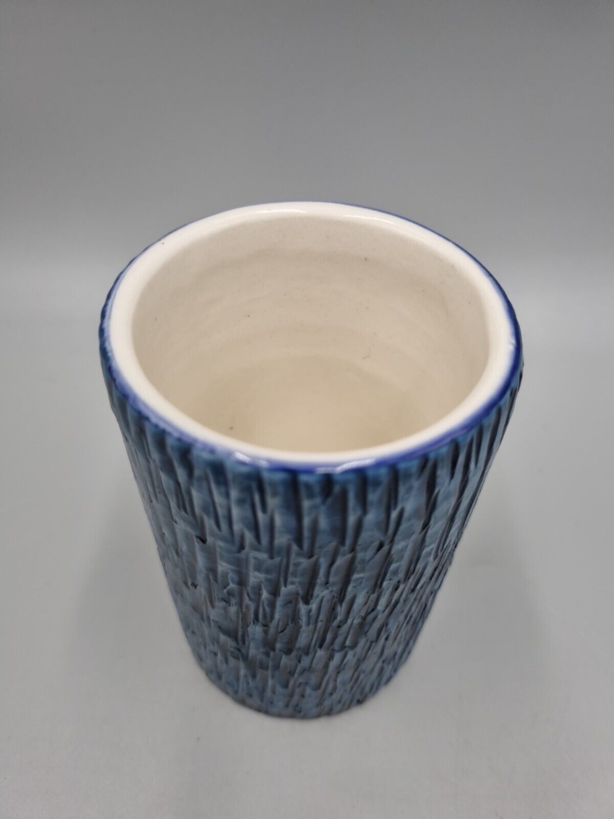 A Vintage Studio Pottery Bristow Malta Blue Textured Beaker. VGC.