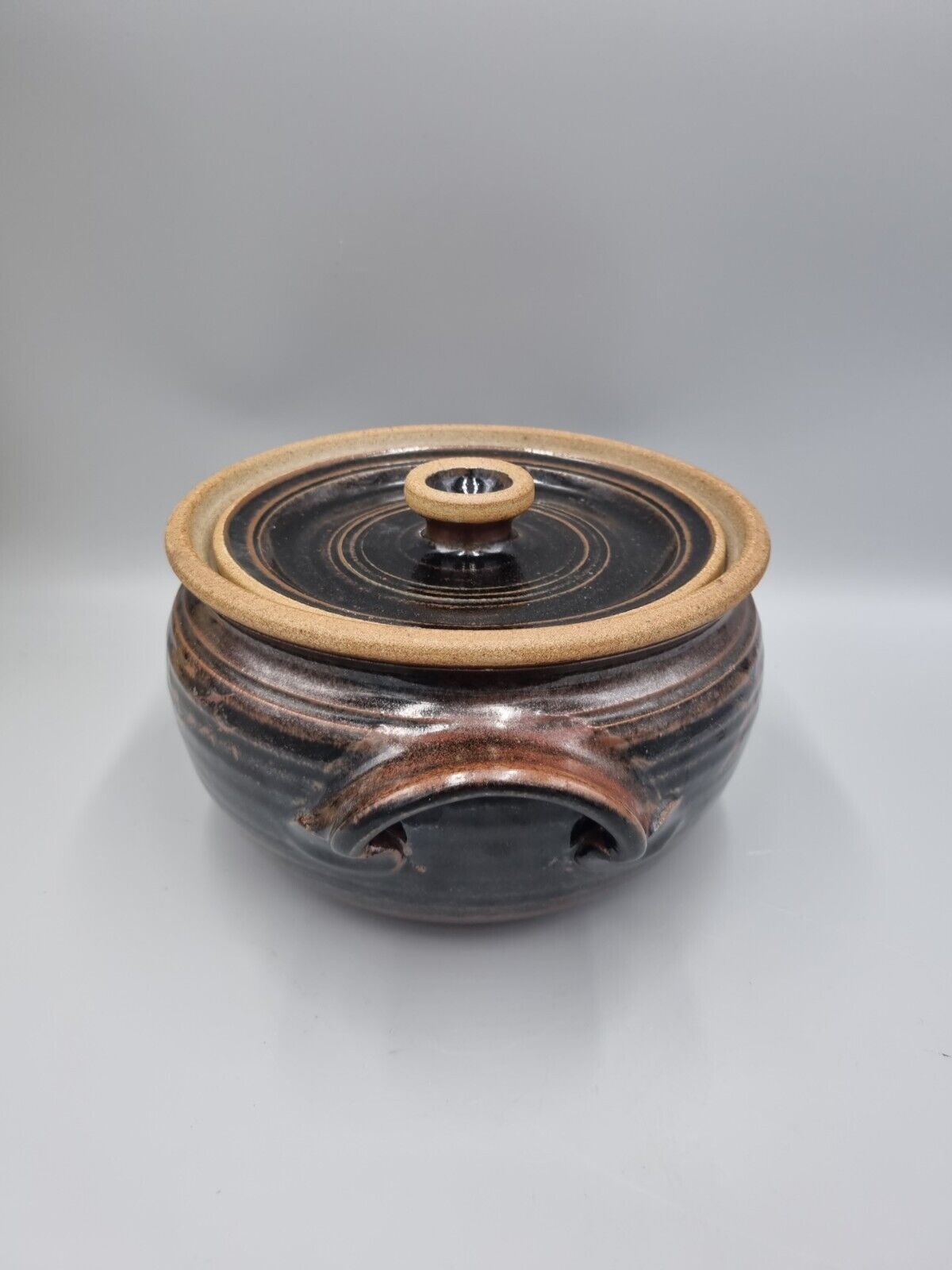 A Large Studio Pottery Lidded Casserole Dish By John Lomas.