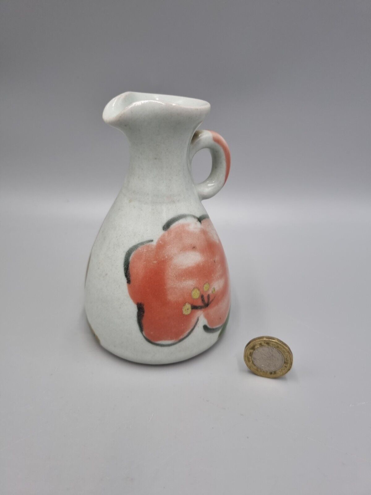 A John & Judy Jelfs Studio Pottery Flower Stoneware Jug, Bourton on Water.