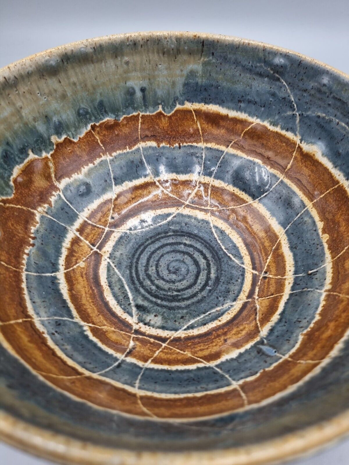 A Large Studio Pottery Bowl With Geometric Decoration, Signed 'CJ' to base.