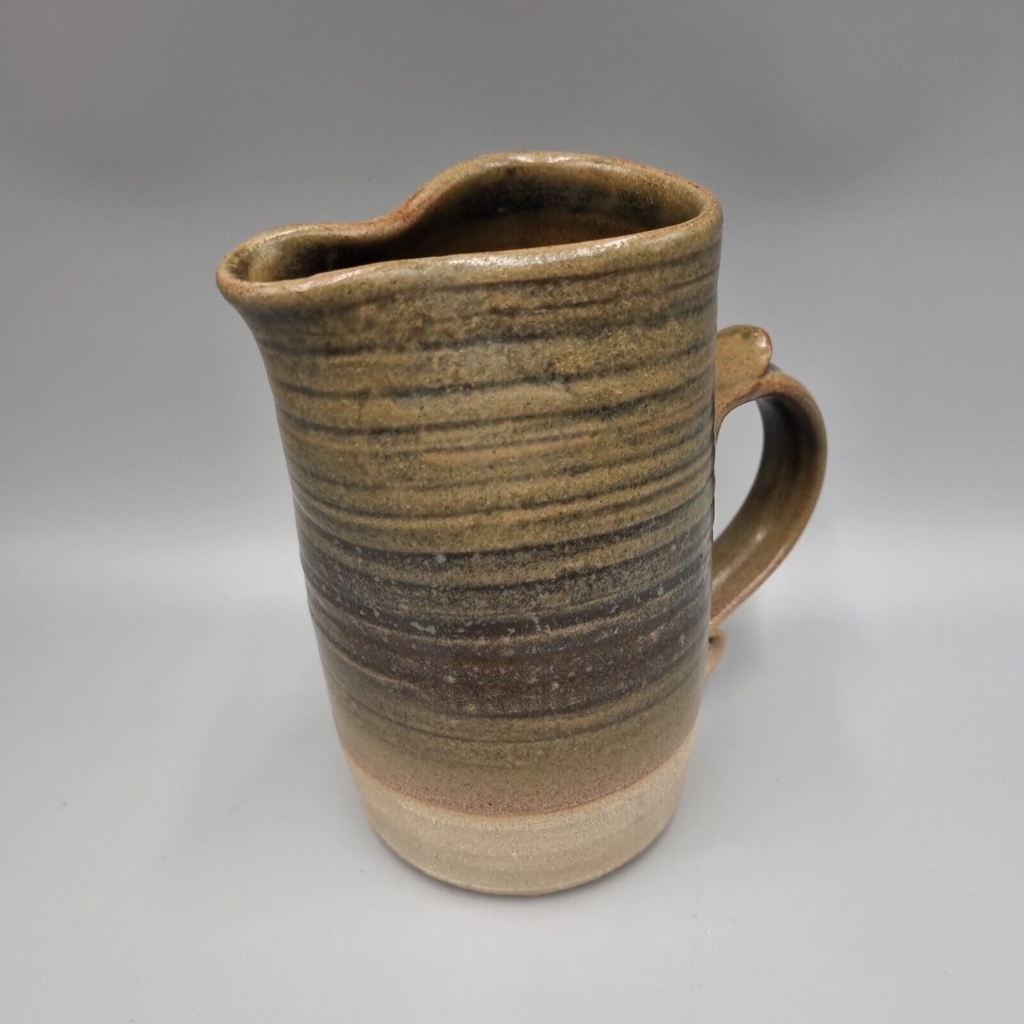 A Jeremy Leach Studio Pottery Moorlands, Devon, Green Glaze Jug, 6 inch. VGC.