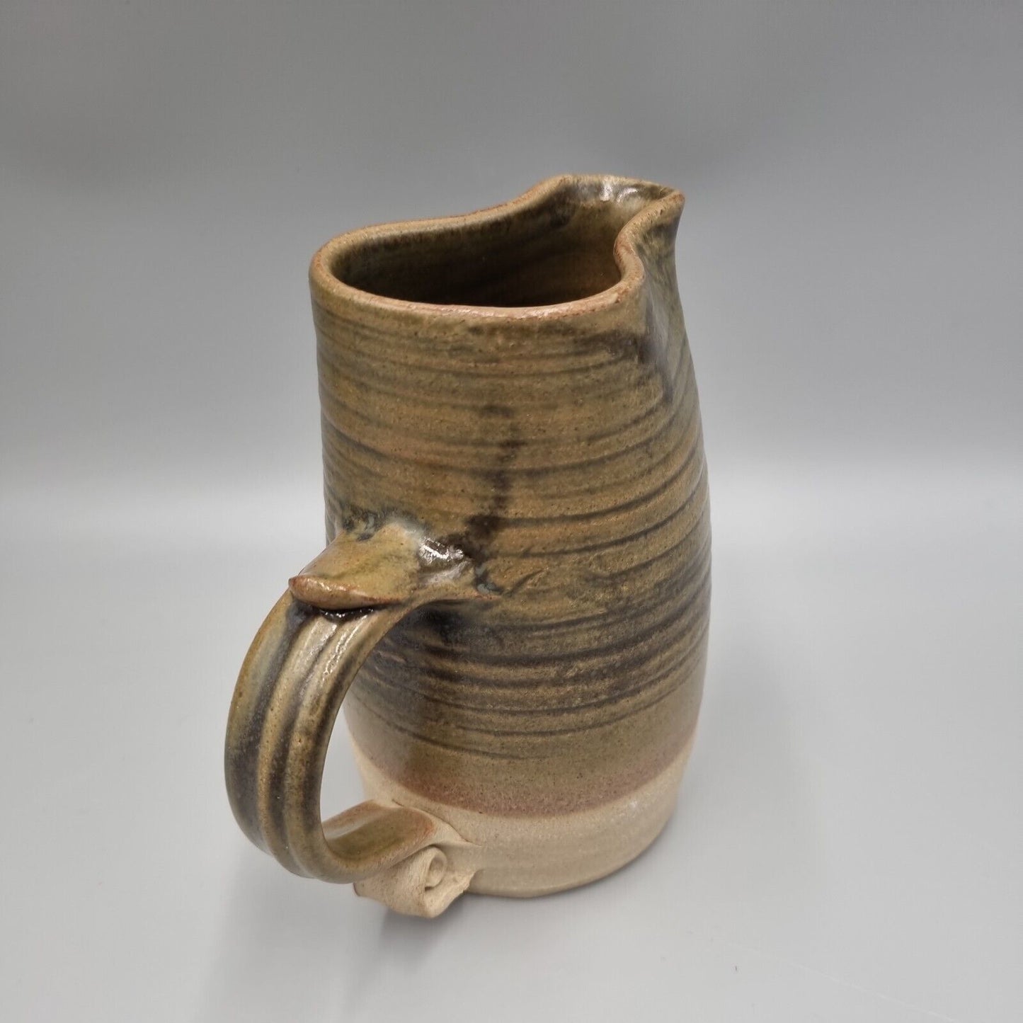 A Jeremy Leach Studio Pottery Moorlands, Devon, Green Glaze Jug, 6 inch. VGC.