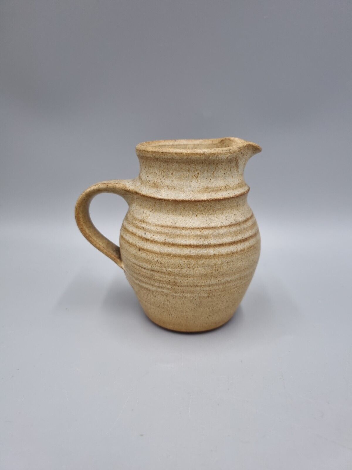 A Small Abington Studio Pottery Jug, Labelled & Impressed Mark.