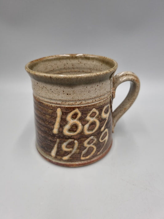 A Studio Pottery Stoneware Mug Impressed 'SP', With A Pentangle And 1889-1989.