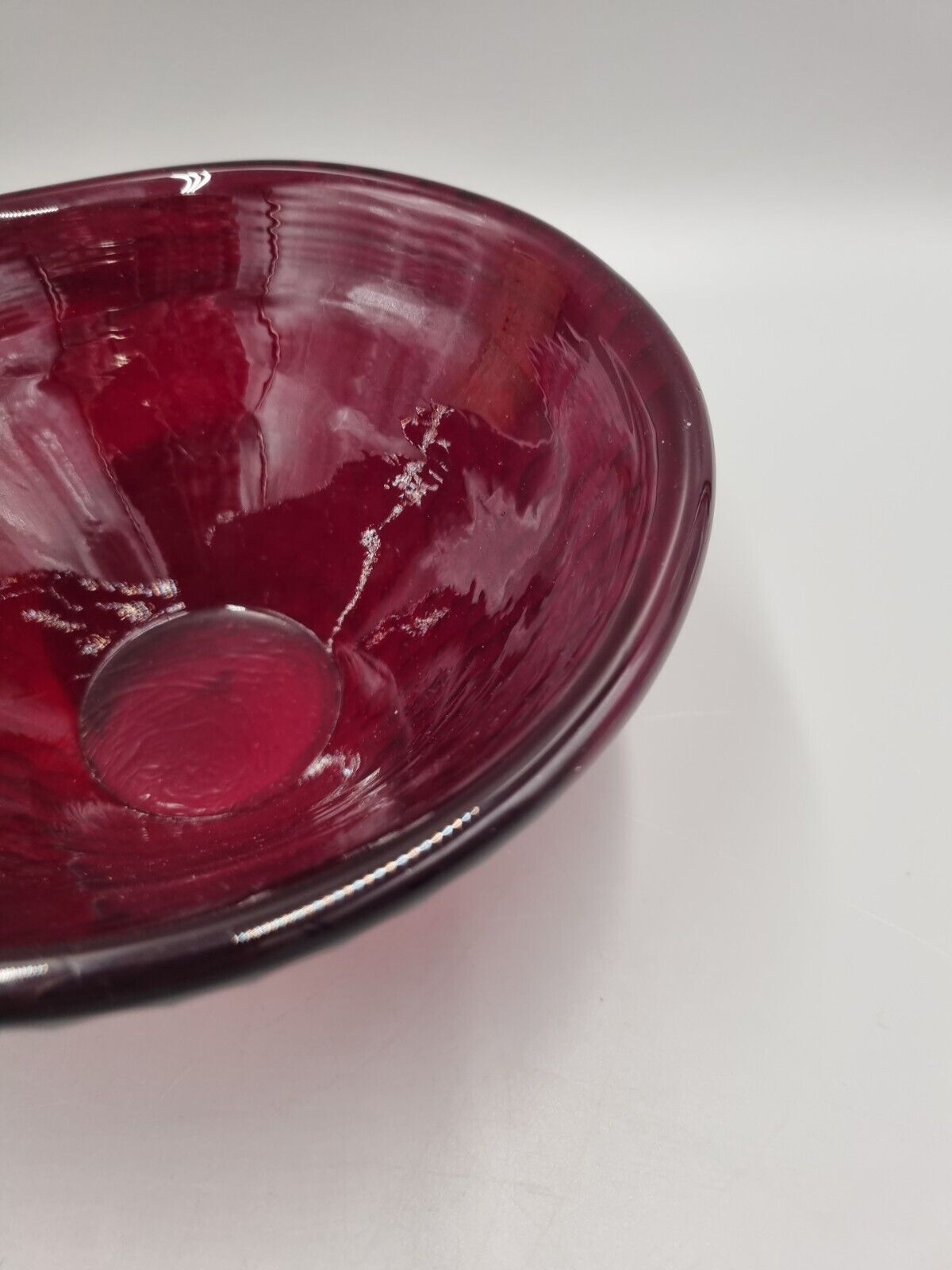 A Studio Glass Multi Faceted Red Bowl.