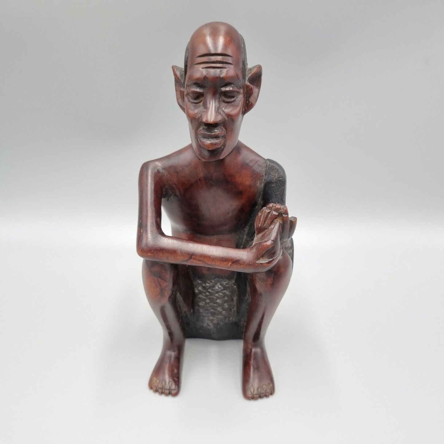 A Vintage Carved Dark Hard Wood African Seated Figure. VGC.