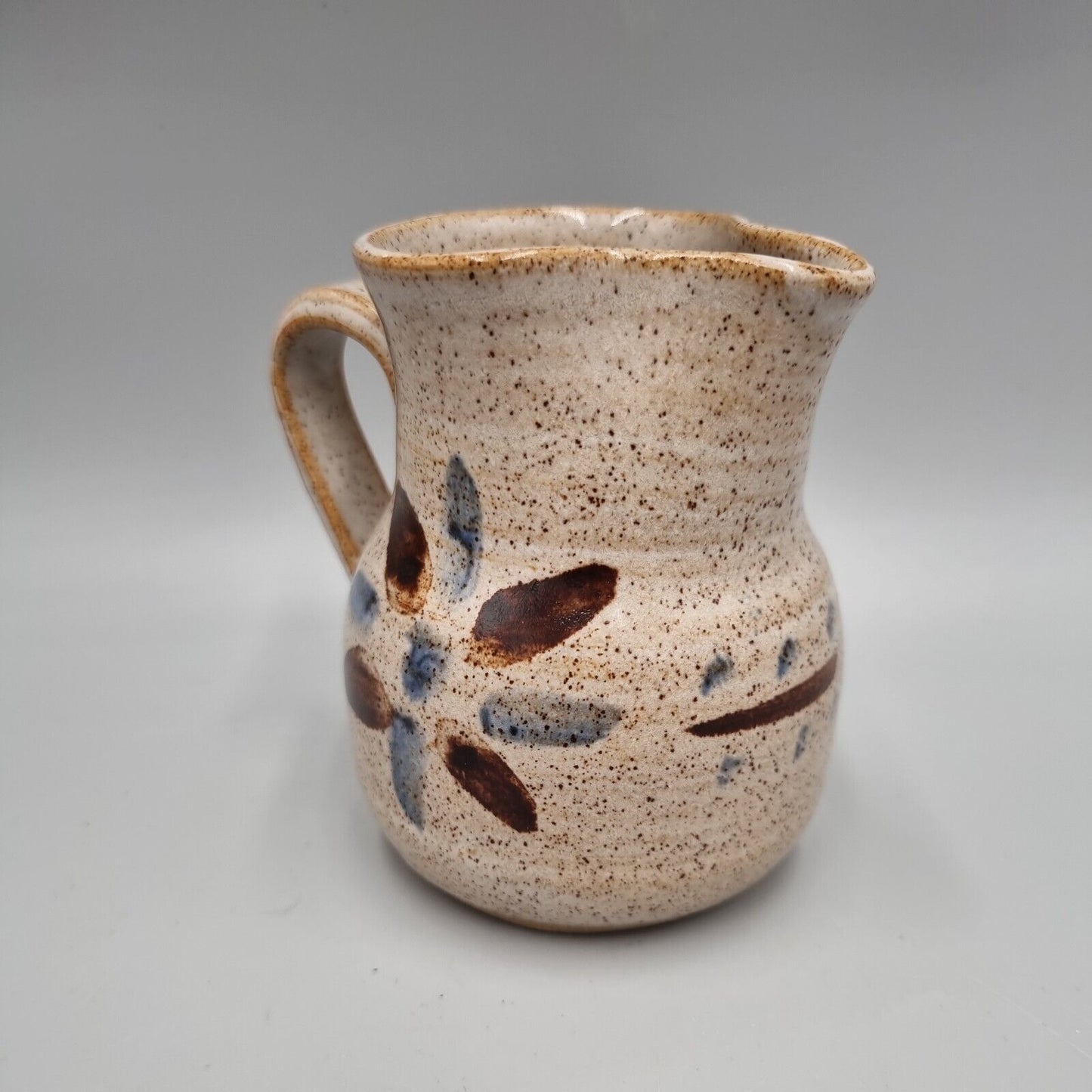 A small studio Pottery Milk Jug With Cross Mark, John Bedding?