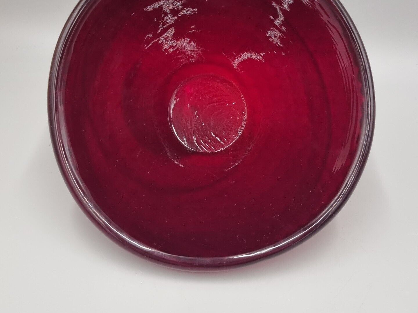 A Studio Glass Multi Faceted Red Bowl.