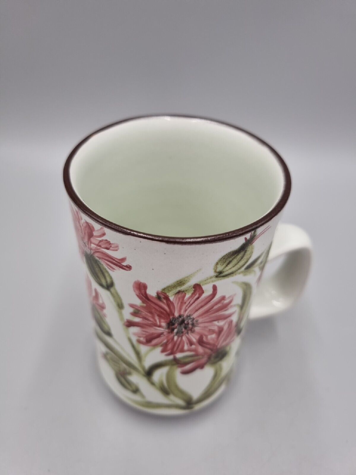 A Tall Stoneware Denby Mug With Floral Design. VGC.