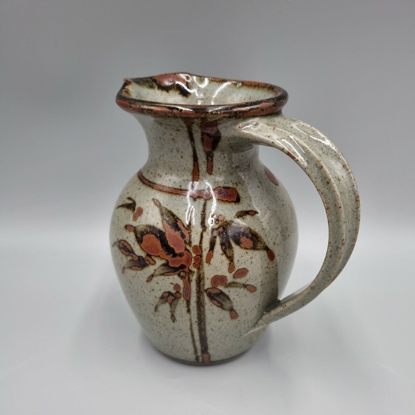 A Studio Pottery Stoneware Decorated Jug By Devon Potter Nick Douglas.