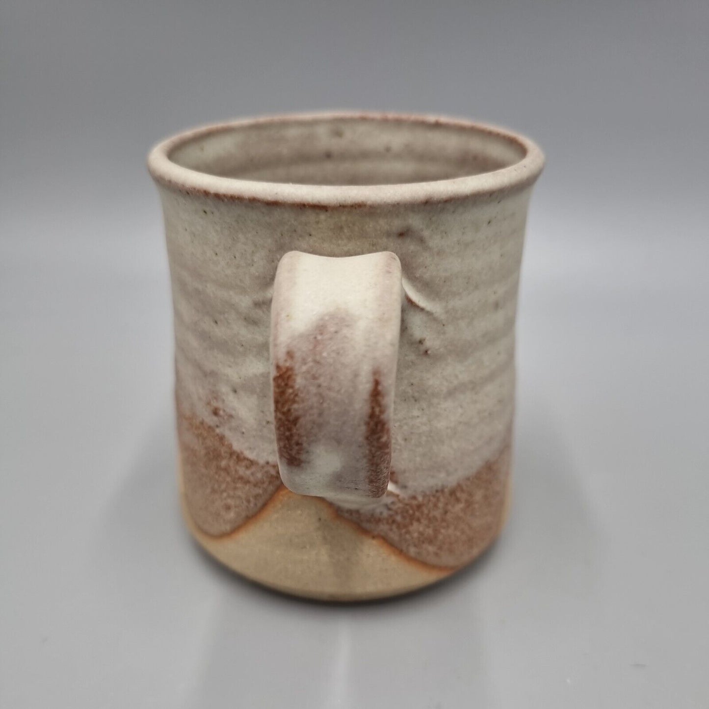 A Roger Bunn Studio Pottery Small Mug. VGC.