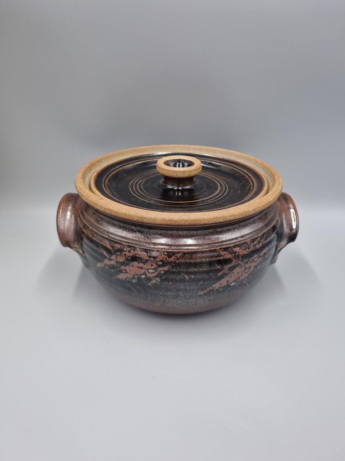 A Large Studio Pottery Lidded Casserole Dish By John Lomas.