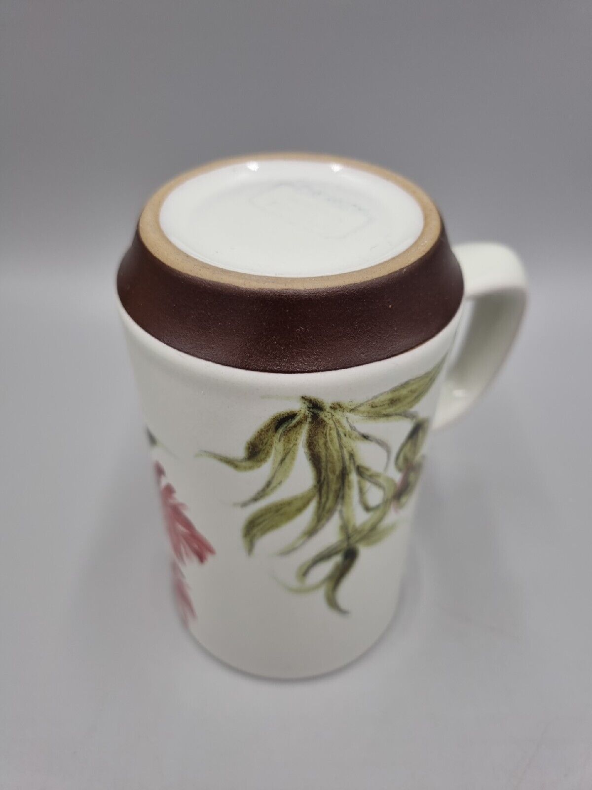 A Tall Stoneware Denby Mug With Floral Design. VGC.