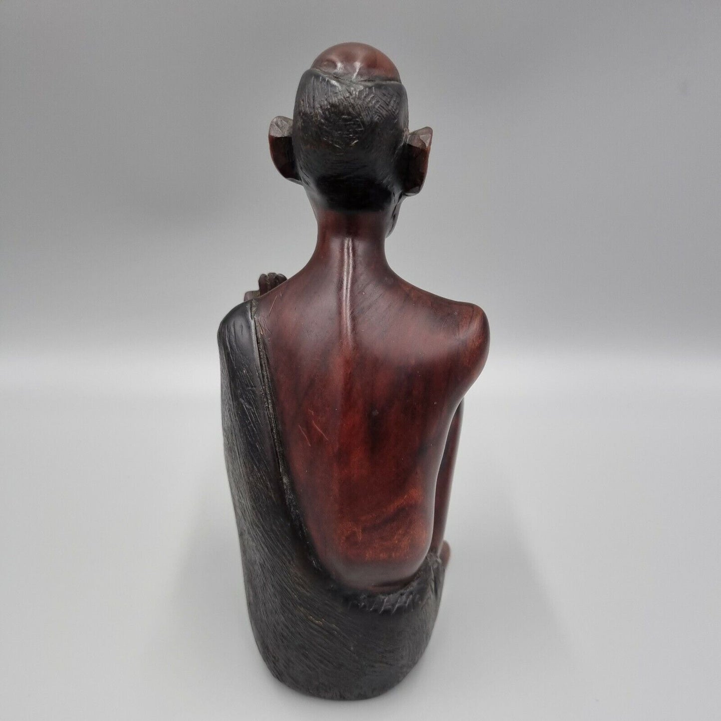 A Vintage Carved Dark Hard Wood African Seated Figure. VGC.