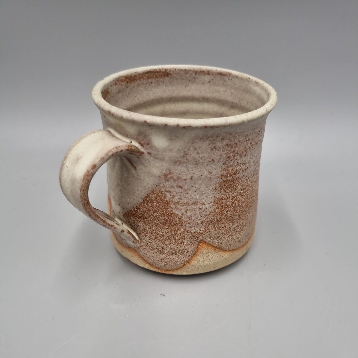 A Roger Bunn Studio Pottery Small Mug. VGC.