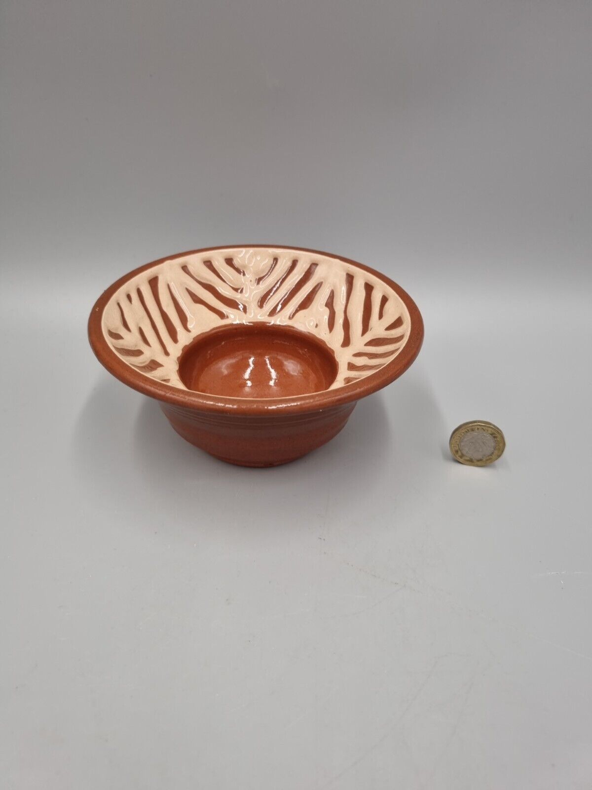 A Slip Ware Decorated Small Studio Pottery Bowl With Makers Mark.