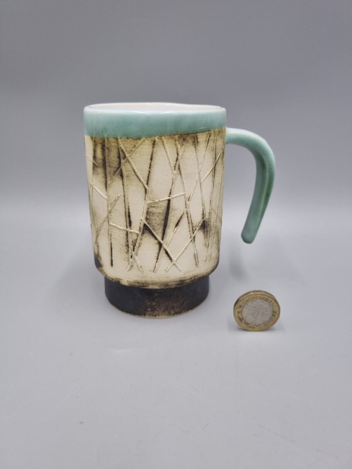 A Studio Pottery Ceramic Tea Mug, Carn Pottery Style, Andre Loret?, Unmarked.