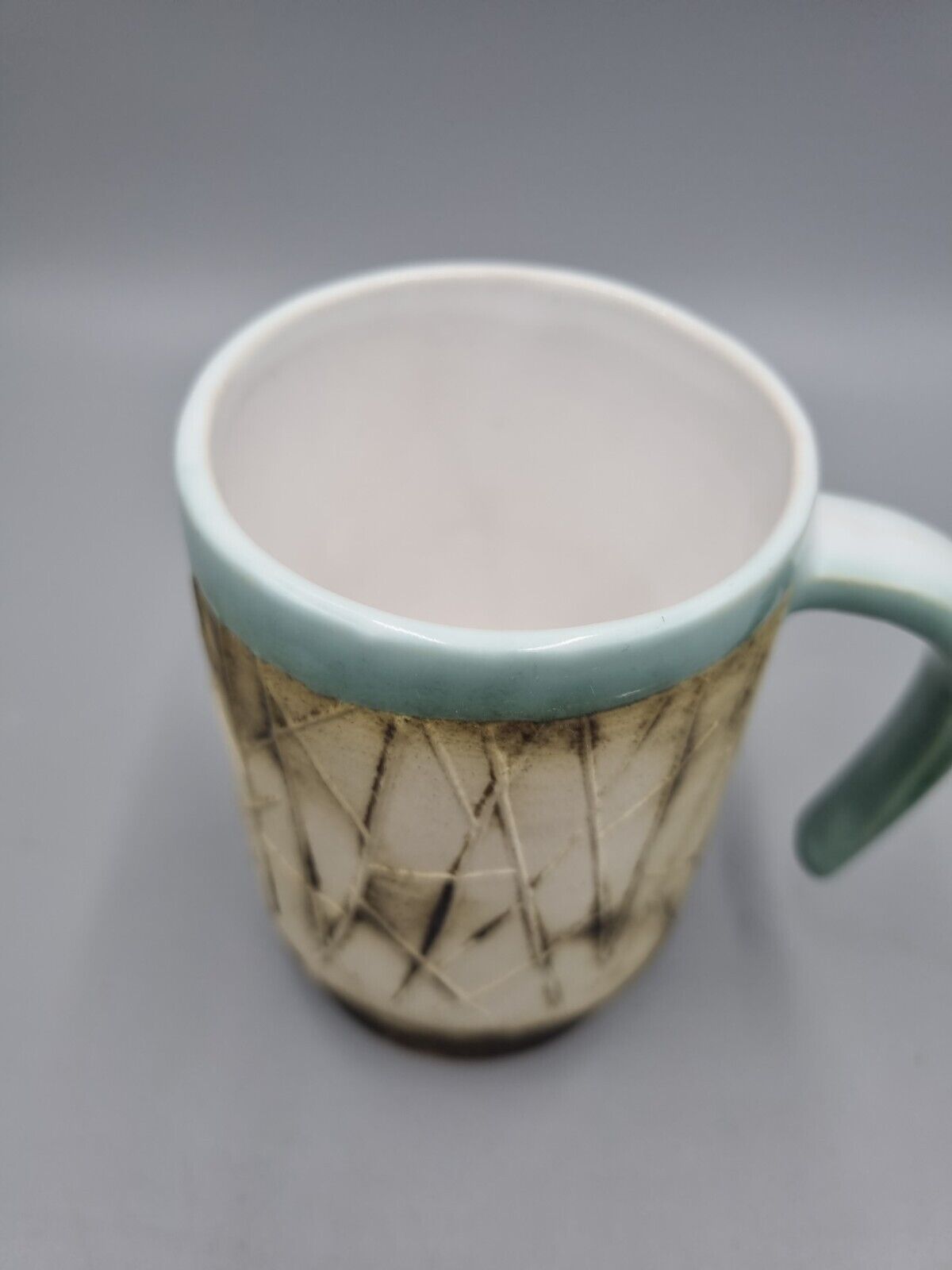 A Studio Pottery Ceramic Tea Mug, Carn Pottery Style, Andre Loret?, Unmarked.