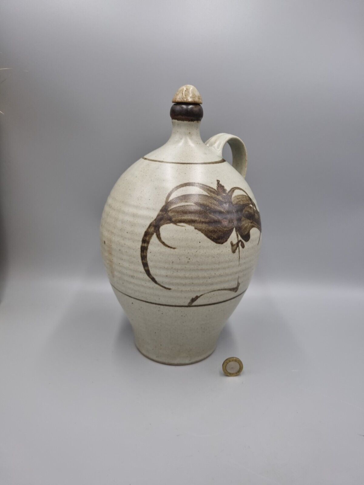 A Studio Pottery Stoneware Flagon, Impressed Makers Mark To Base. Screw Top.