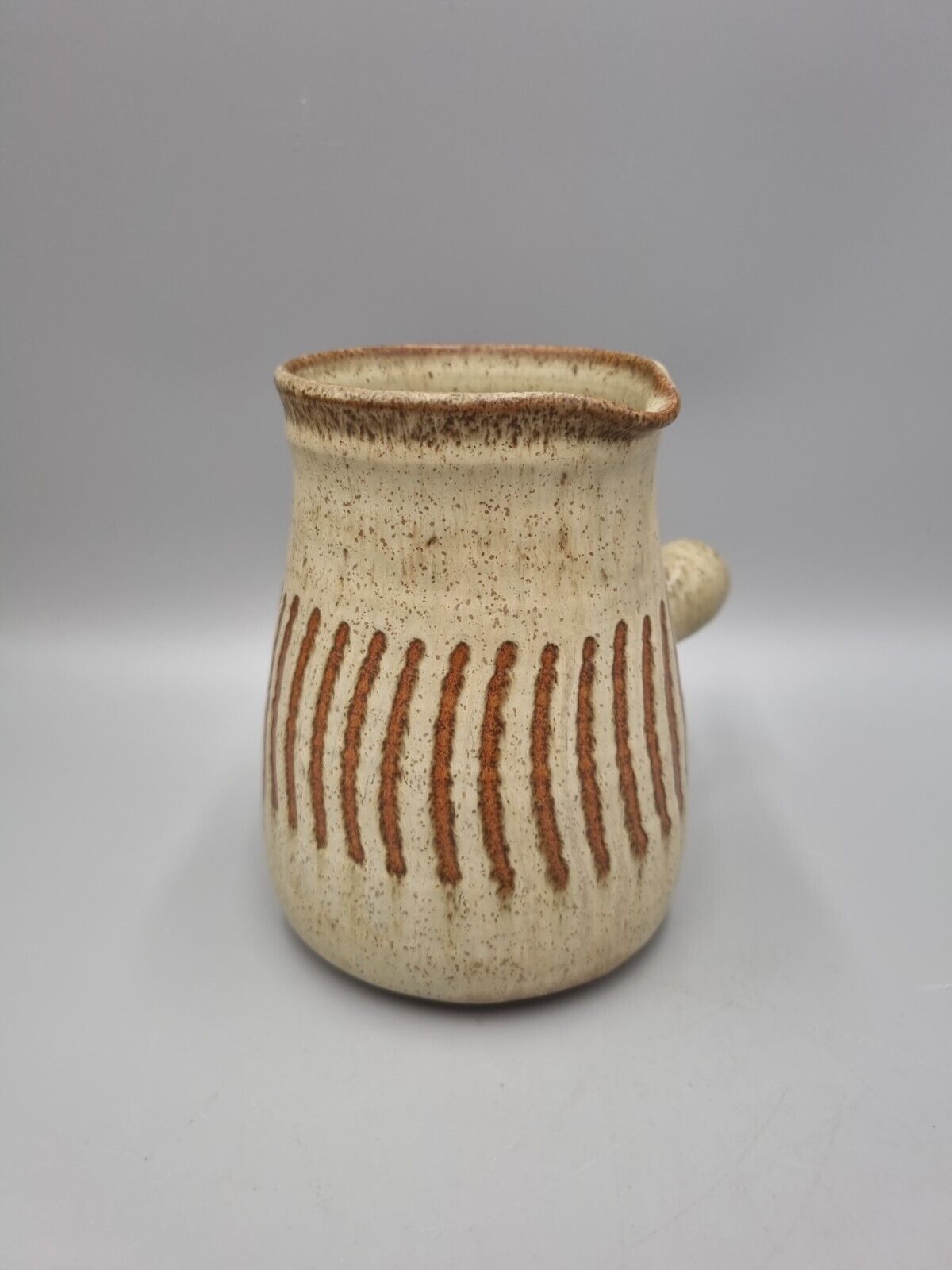 A Roger Stribley Studio Pottery Jug With Side Handle.