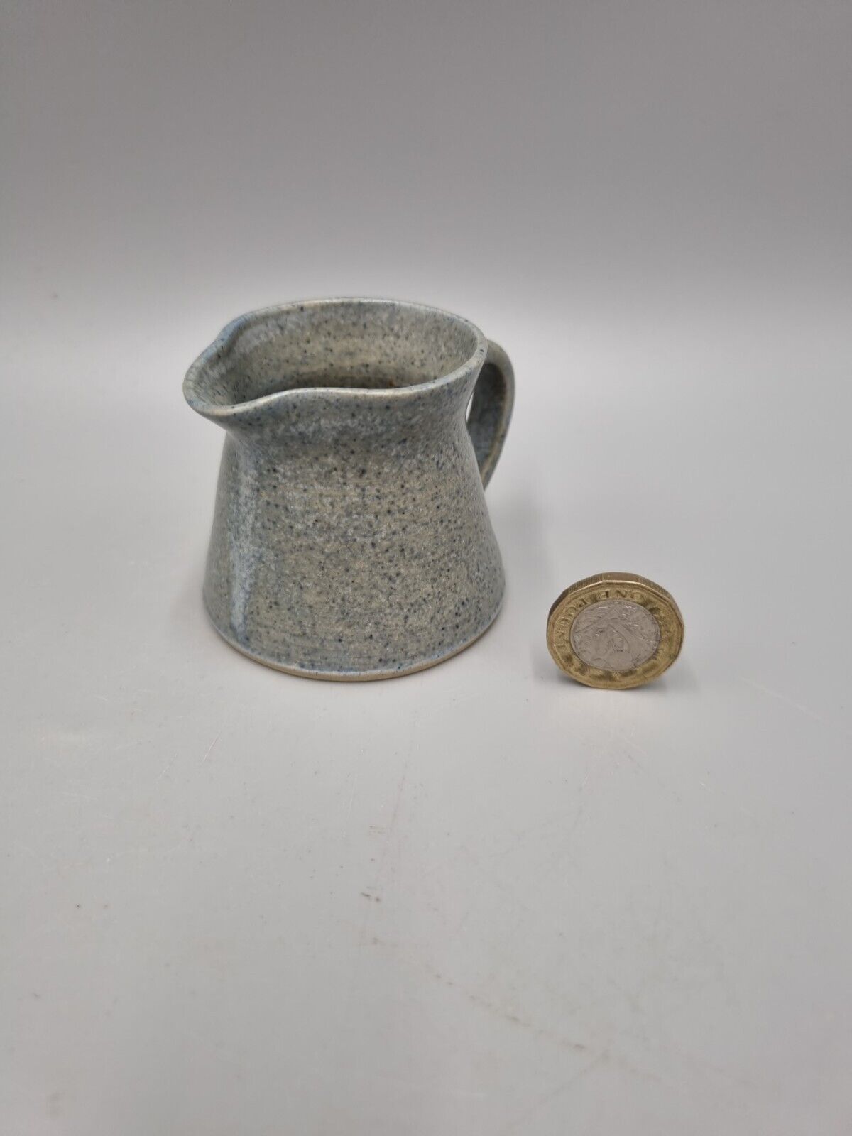 A Small Studio Pottery Jug, 'Storrington' Written To The Base.