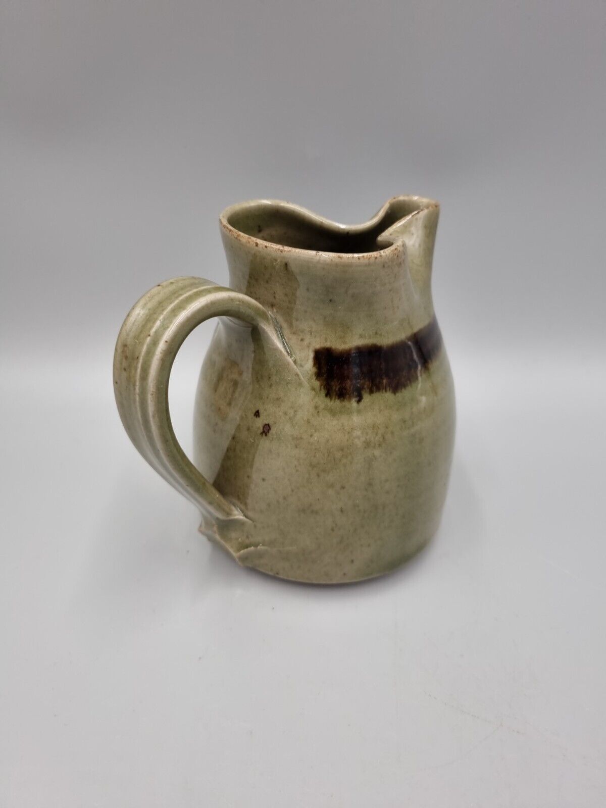 A Richard Champion, Monkleigh Studio Pottery Jug / Pitcher. Devon.