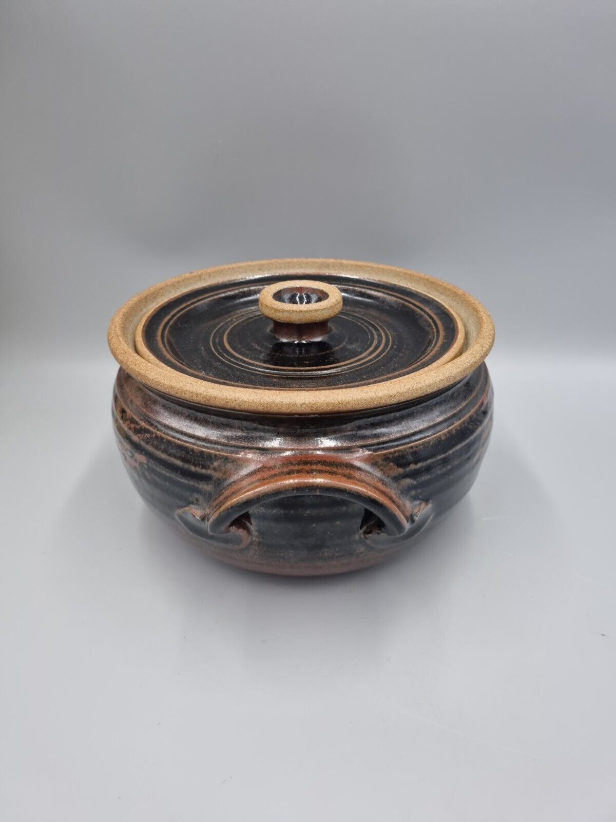 A Large Studio Pottery Lidded Casserole Dish By John Lomas.