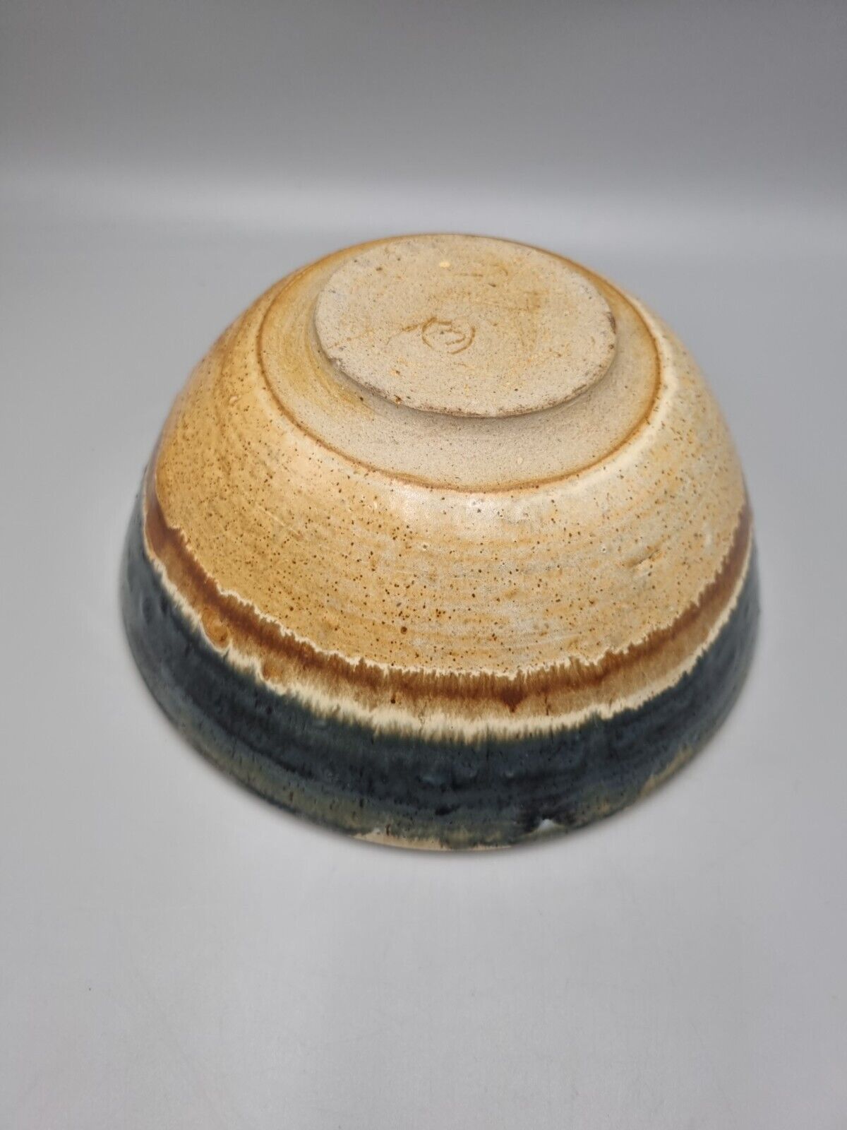 A Large Studio Pottery Bowl With Geometric Decoration, Signed 'CJ' to base.