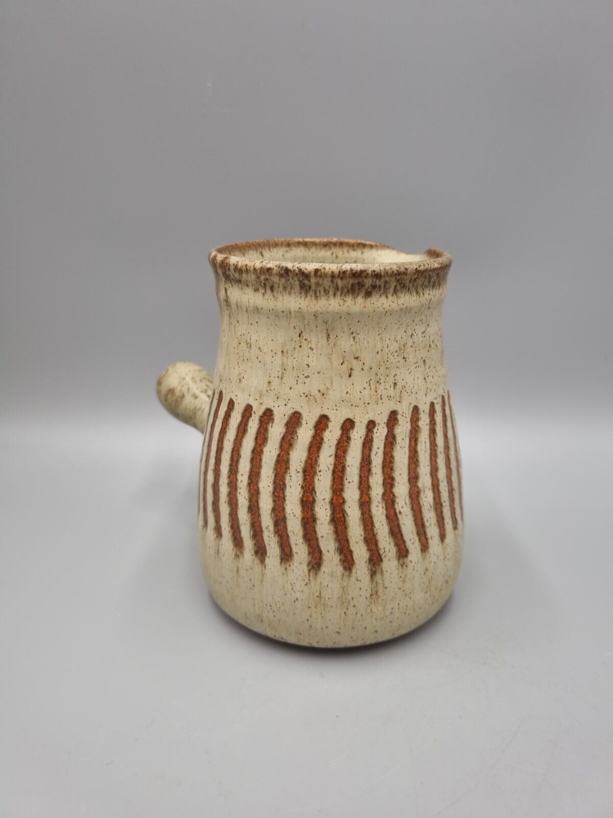 A Roger Stribley Studio Pottery Jug With Side Handle.