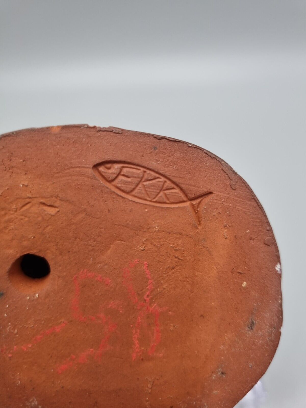 A Handmade Studio Pottery Figurine Of A Woman In Clogs, Fish markers Mark.