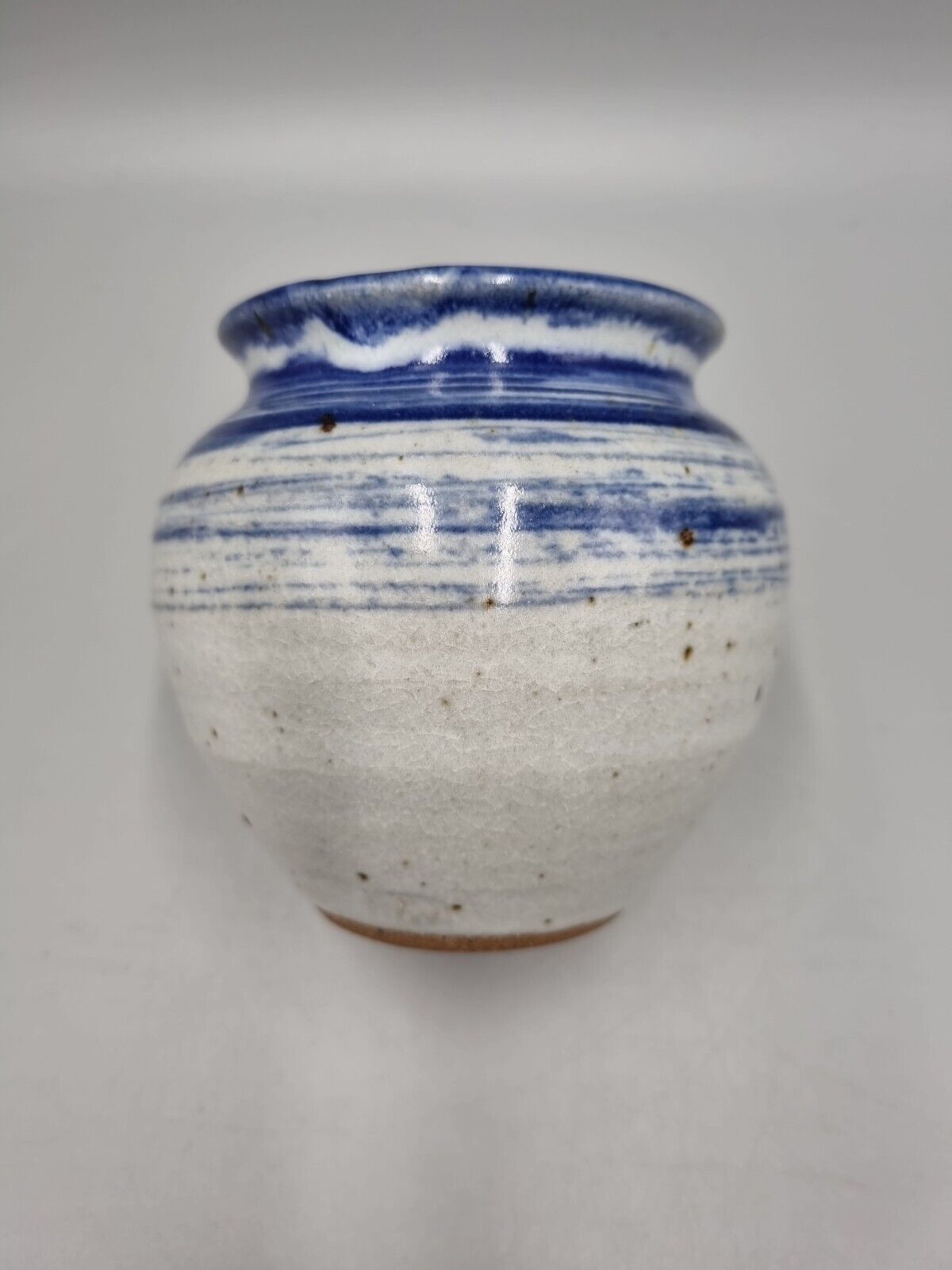 A Studio Pottery Bulb Vase, Abstract Blue Design. Impressed Mark 'JW' / 'TW'.