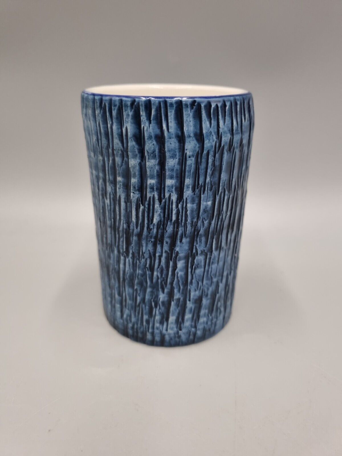 A Vintage Studio Pottery Bristow Malta Blue Textured Beaker. VGC.