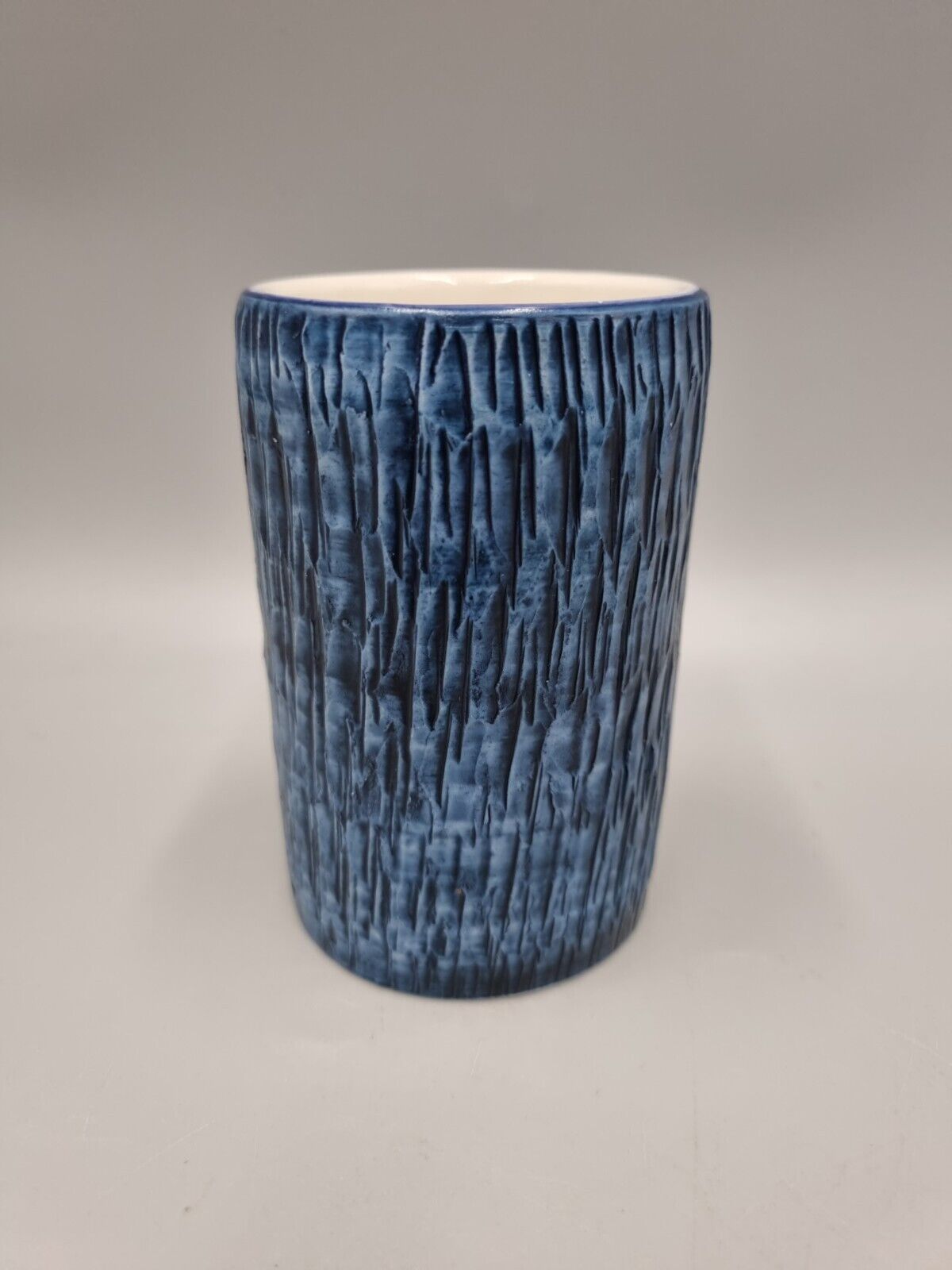 A Vintage Studio Pottery Bristow Malta Blue Textured Beaker. VGC.