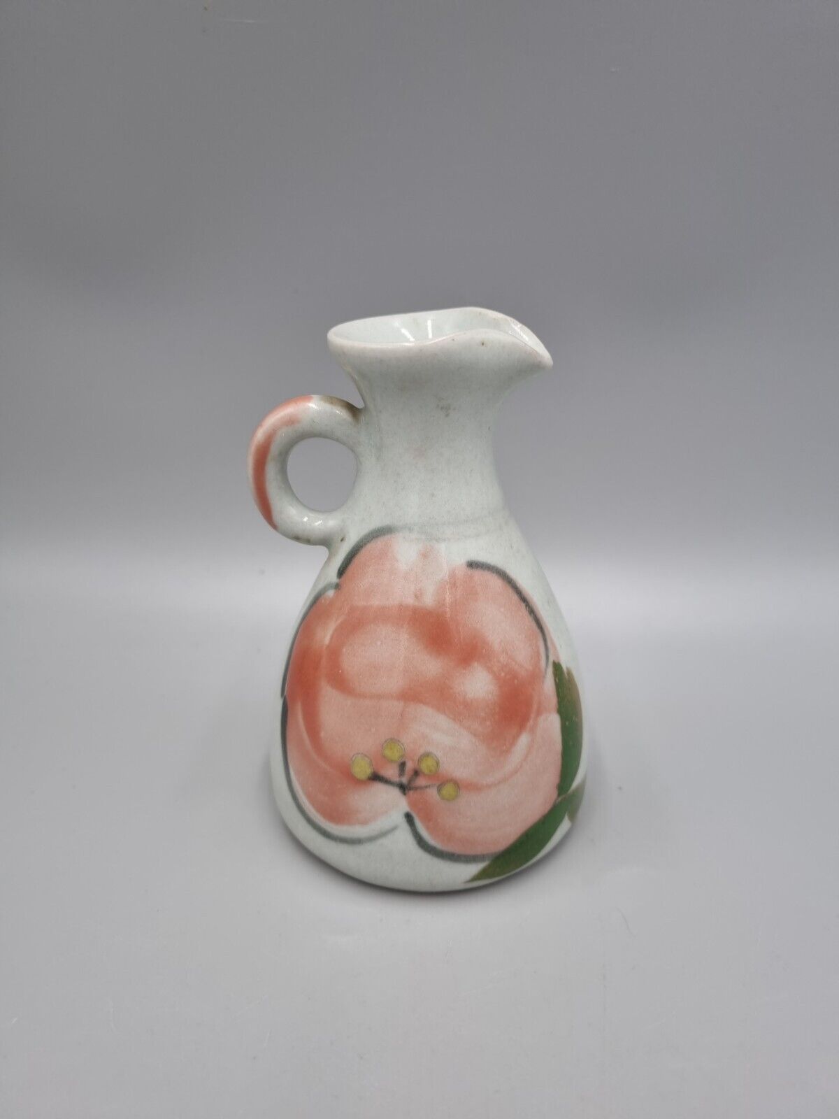 A John & Judy Jelfs Studio Pottery Flower Stoneware Jug, Bourton on Water.