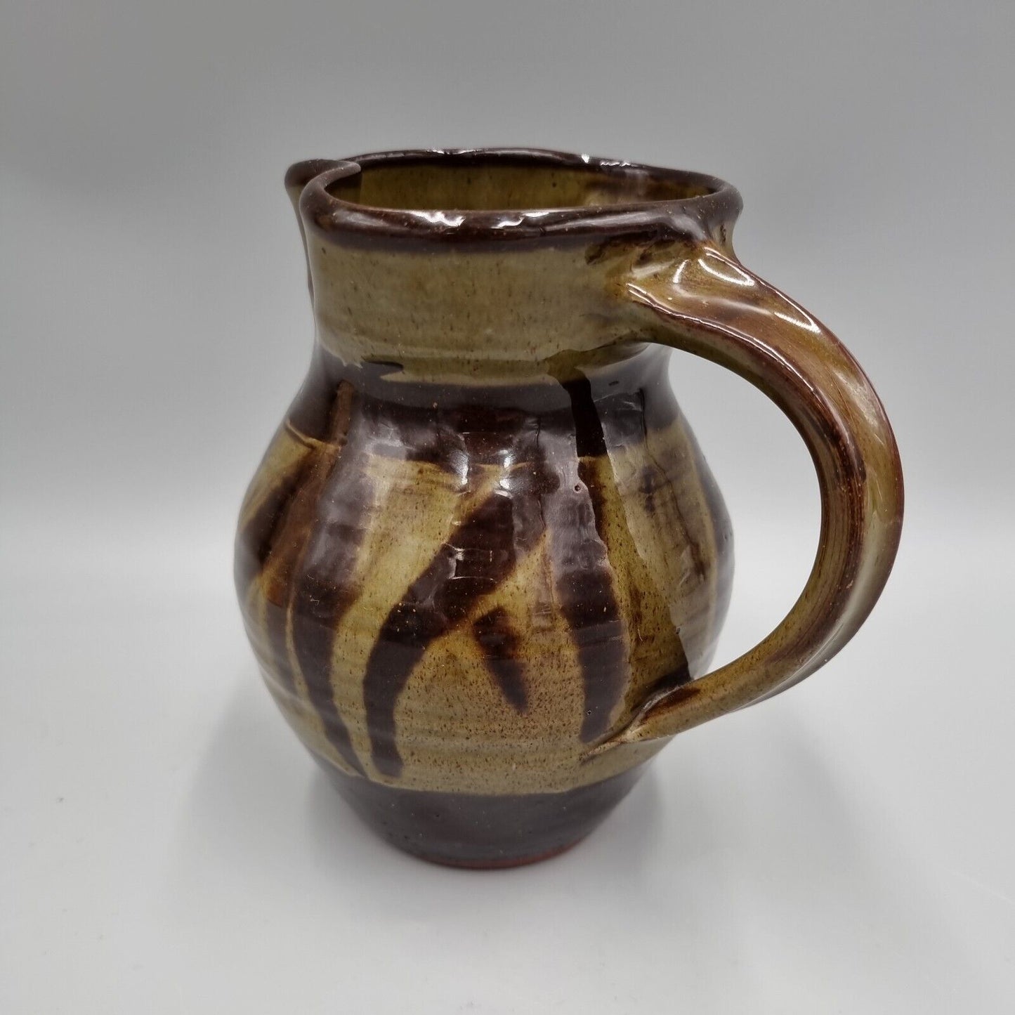 An Elizabeth Whitehouse Boscastle Studio Pottery Jug H-13.5cm. VGC.