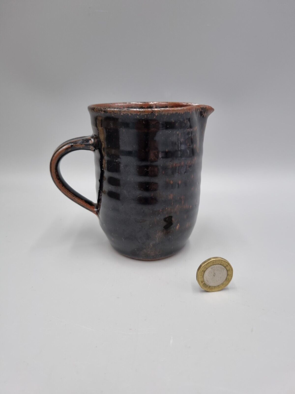 A Studio Pottery Cylinder Jug / Creamer, Signed To Base.