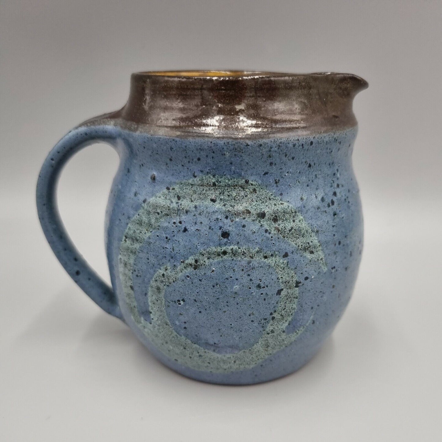 A Miles Bell Symondsbury Studio Pottery Jug, Incised to base, 'MB'.