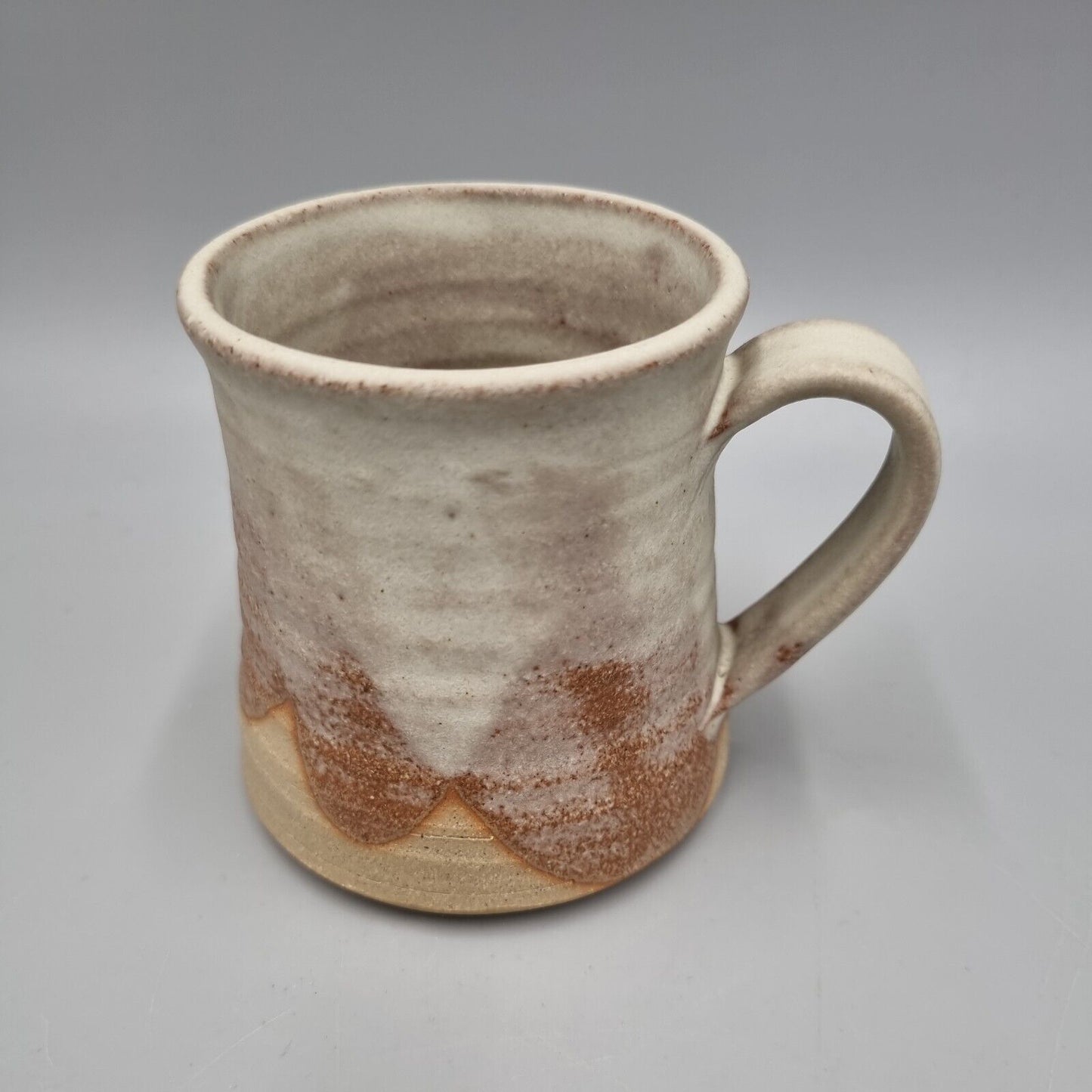 A Roger Bunn Studio Pottery Small Mug. VGC.