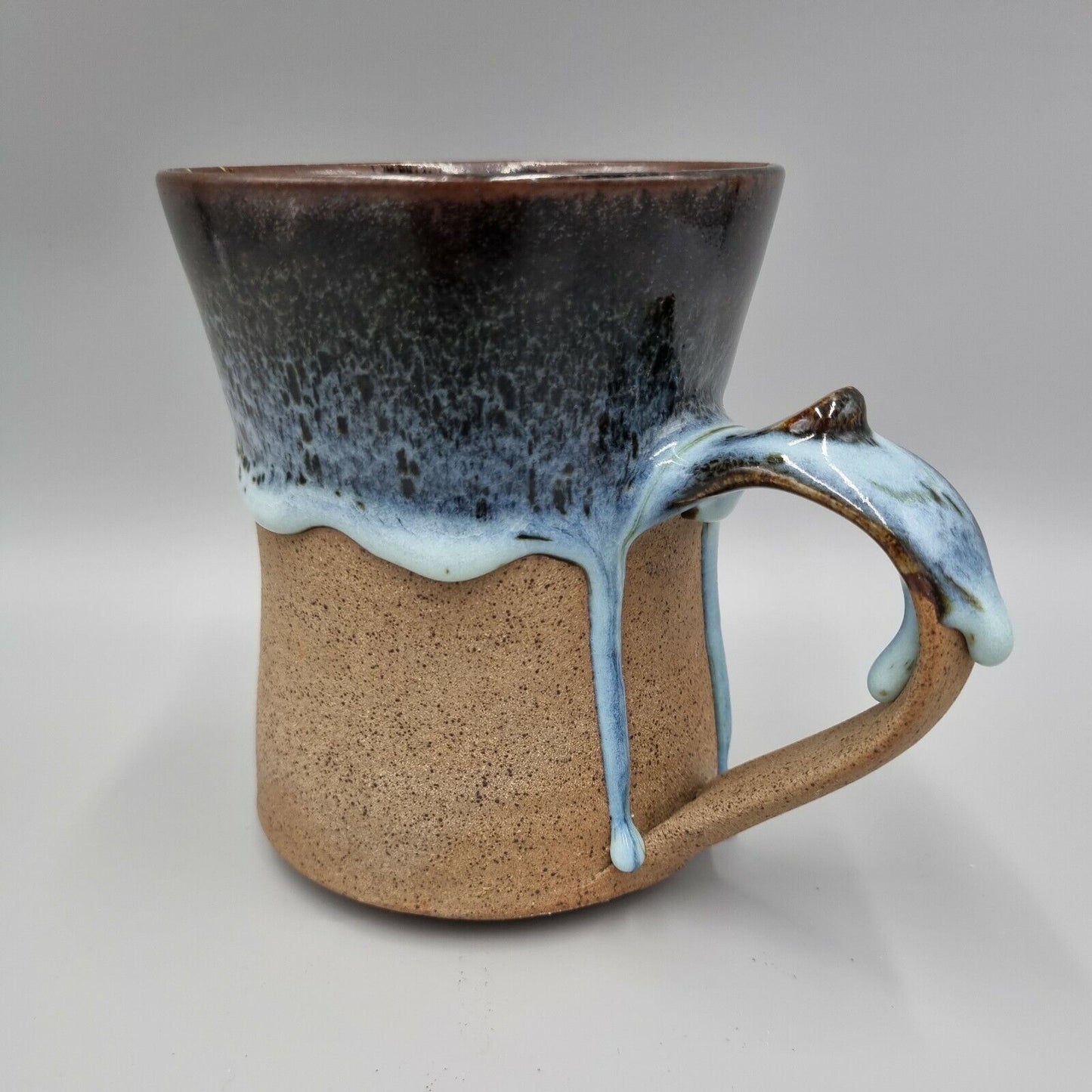 Pint Tankard Studio Pottery with heavy drip glaze. Makers mark to the base.