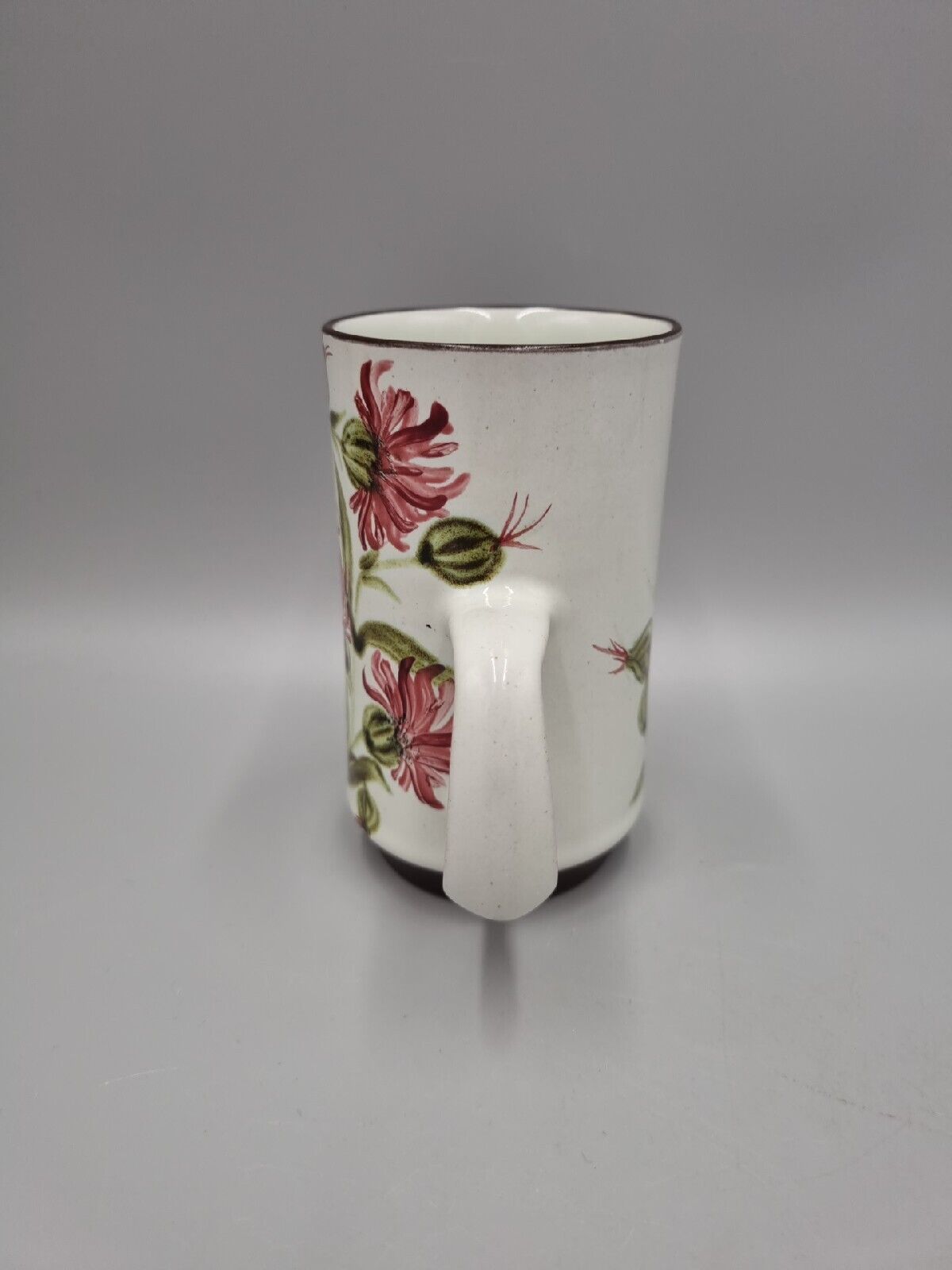 A Tall Stoneware Denby Mug With Floral Design. VGC.