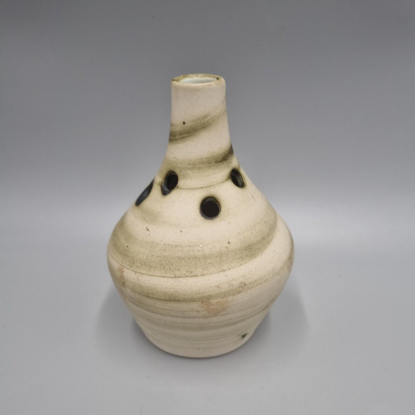 A Carn Studio Pottery Vase - John Beusmans, Round Form Bud Vase With Piercings.