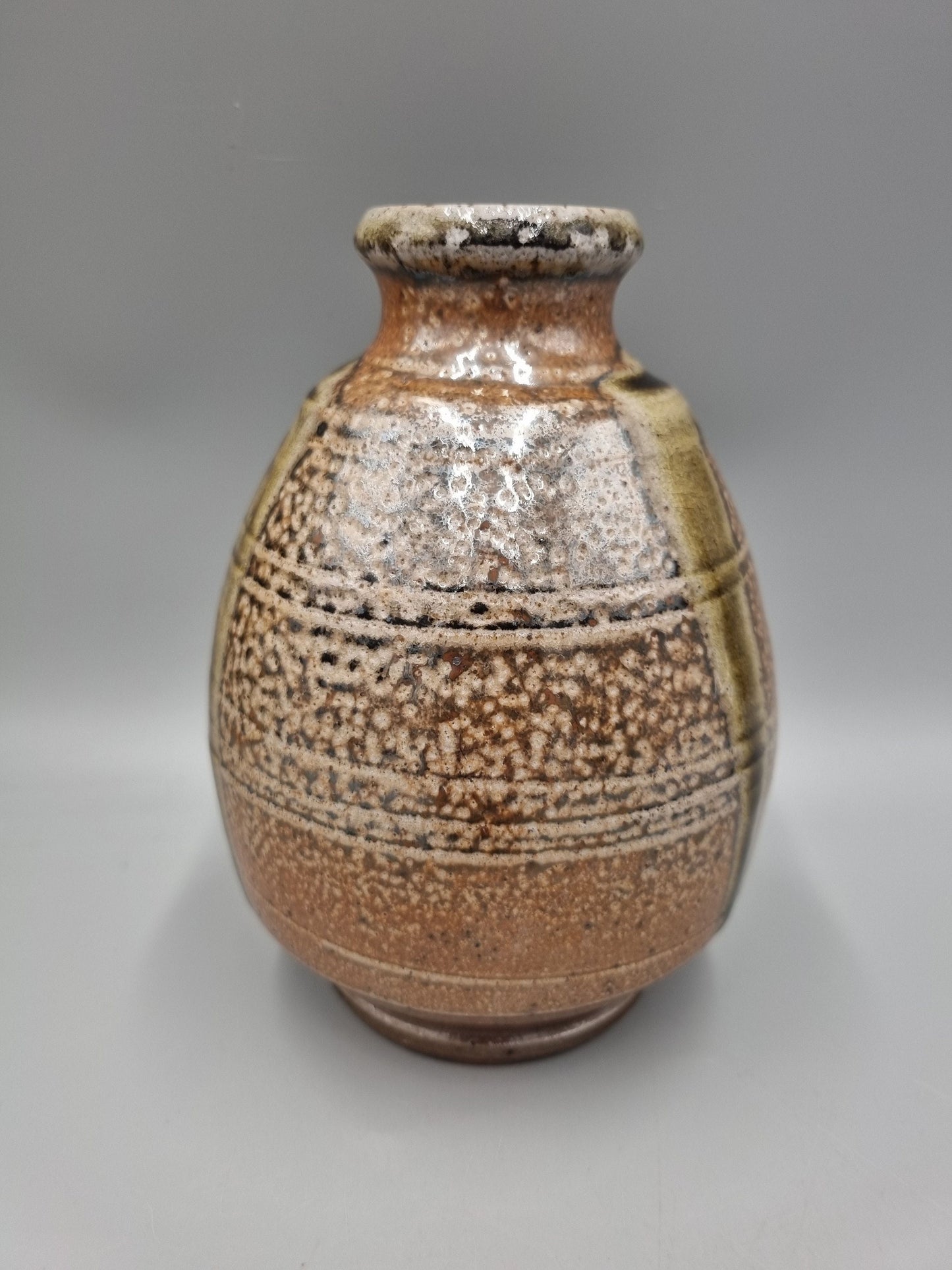 A Studio Pottery Footed Ovoid Vase By John Jelfs.