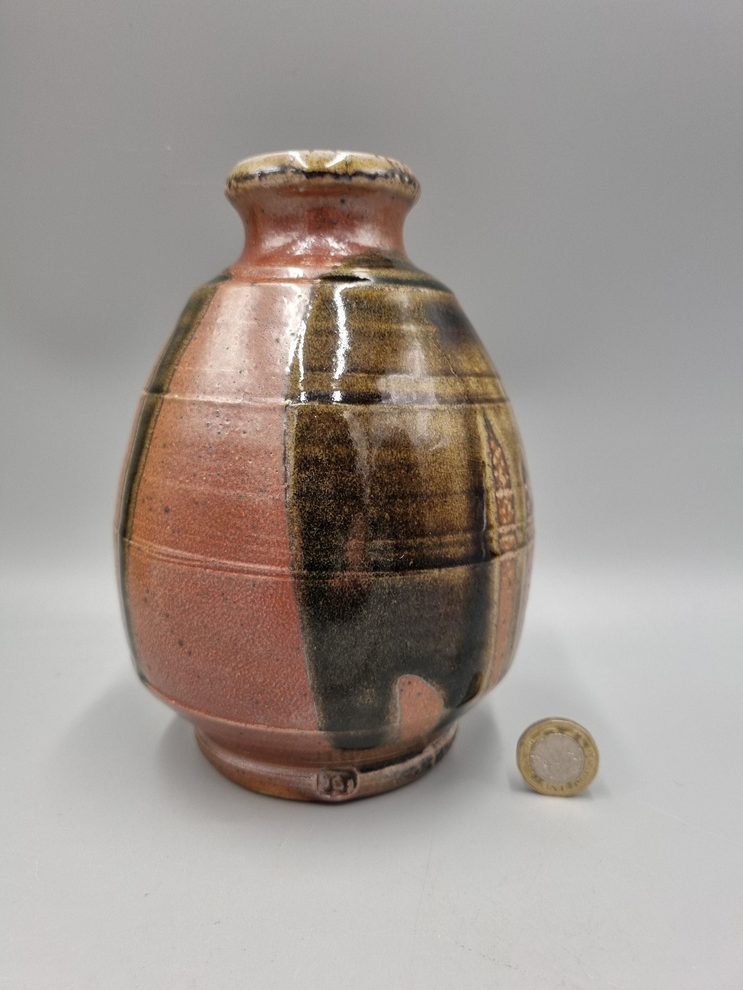 A Studio Pottery Footed Ovoid Vase By John Jelfs.