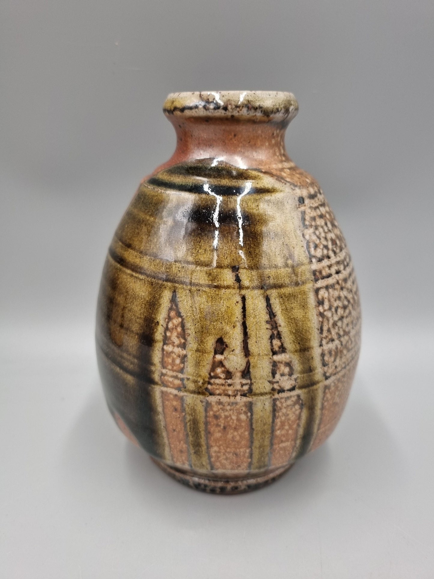 A Studio Pottery Footed Ovoid Vase By John Jelfs.