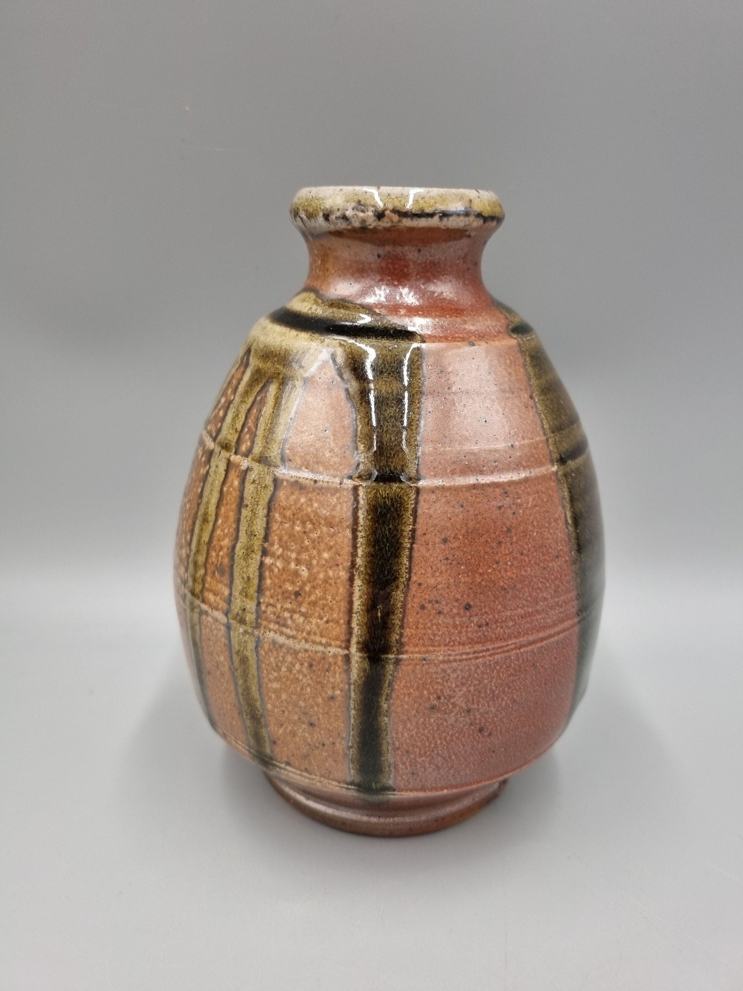 A Studio Pottery Footed Ovoid Vase By John Jelfs.